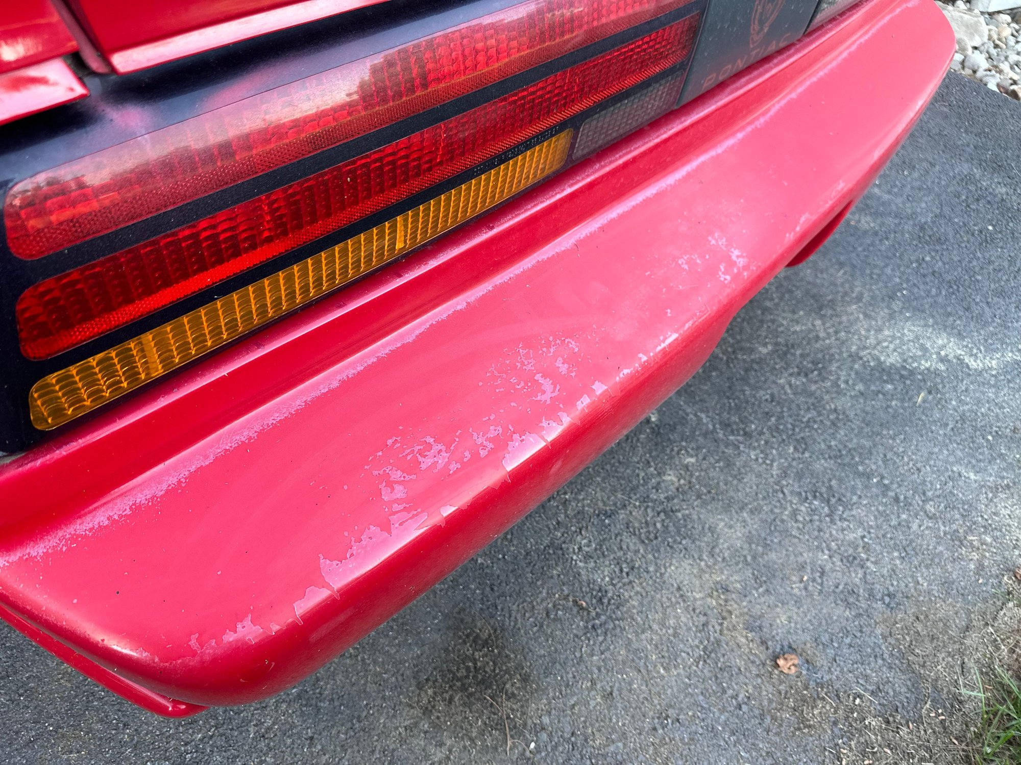 Damaged paint on rear bumper