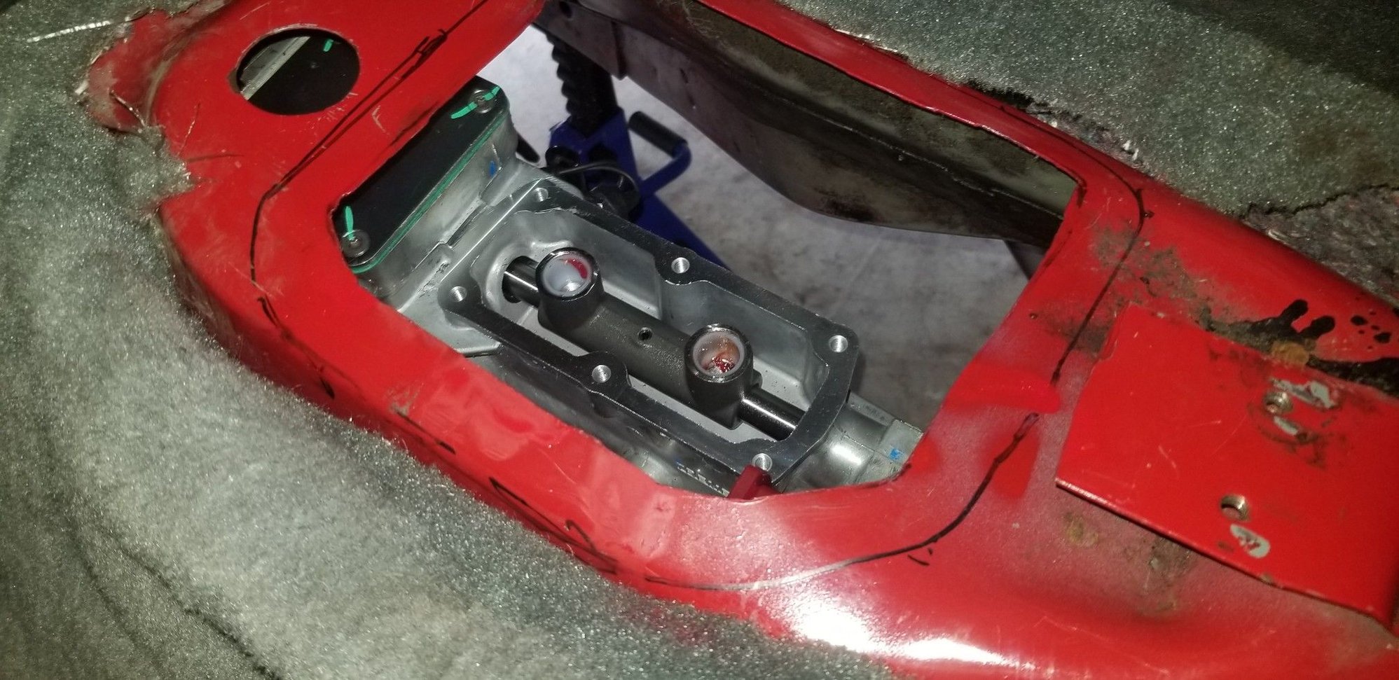 Access to the shifter mounting with the trans about an inch from being fully seated, and angled down
