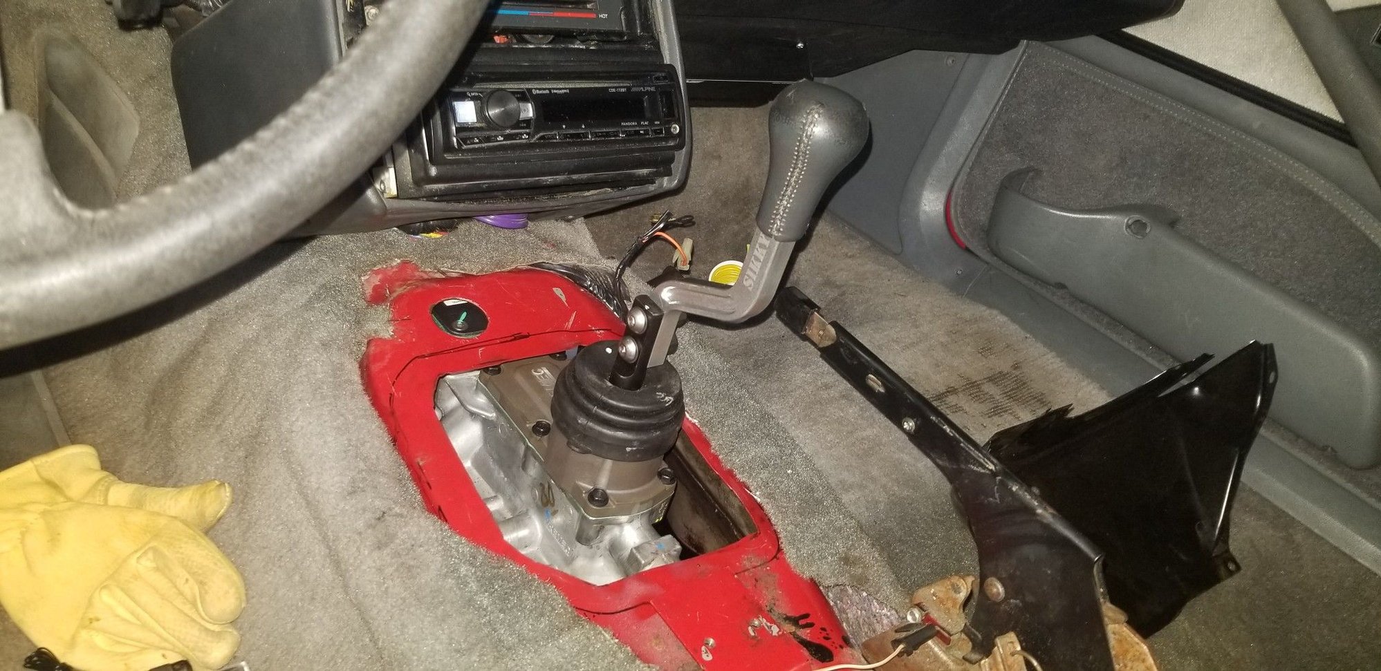 First test fit with the arm!  I ended up putting the arm on the other side of the shifter nub so it cleared the center console.  Plenty of clearance with the radio in 1st/3rd/5th!