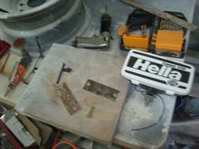 Cut and drilled a set of brackets to mount te Hella lights.
