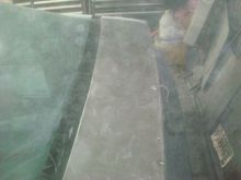 Passenger side of hatch stripped to bare metal.