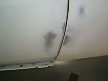 After twisting and bending the lower rear half of the fender to be flush with the door.