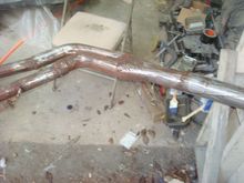 Treated it with acid and then some grinding.