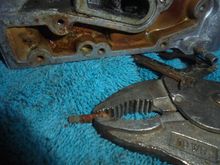 Was able to get the rung off coolant plate bolt out.