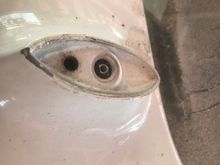 I enlarged an existing hole in the left inner mount.