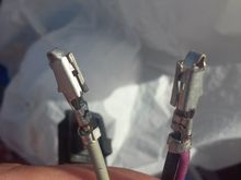 What I did with the wire leaving the level sensor, was combine it into the same terminal as the motor's ground wire. On the left is the motor's power wire. Not shown is the pink/purple level sensor input wire.