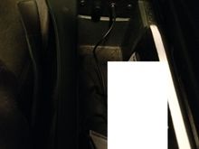 Aux in and bass knob in the center console. Had to redact my insurance card from the picture.