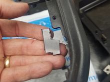 Using a scrap piece of ABS sheet, I cut out this section to build up the backside of the brace.  Piece is shaped to make maximum contact with rhe original material, yet leace room for the slot for the radio faceplate. 