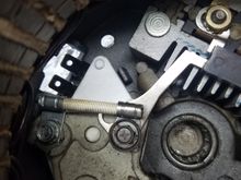 New voltage regulator peaking out at the bottom.