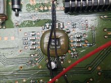 Ground connection.  This one was tough to solder in.  Took scraping off the coating and getting down to bare copper and solder, plus lots of heat to get the factory solder to bond.