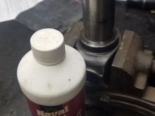 Jaws on vice tightened only enough to keep the yoke from falling out.  Two of these treatments did the trick!