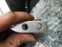 Tried to get a view of the holes on the old shift handle vs the Pro 5.0; not much smaller, but small enough to need drilling.  Bottom hole was drilled out one size up, top hole was 2 sizes up to account for the angle of the mounting face.