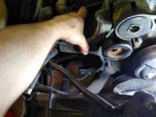 This picture of the Caprice bracket in place was a bit hard to get.  My thumb is pointing roughly towards the stud, which has nothing to connect to.