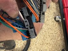 On this connector, the new harness has an orange wire on the far right bottom, missing the orange/black wire that the old harness has. Difference here?