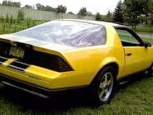 bumblebee BEFORE MOVIE,  91 with yellow guts and all done yellow inside out body. black out , black yellow z28 rims. $300 barn find car pre in TEAL green.