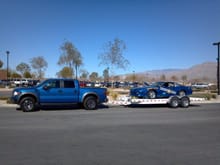 shown here in tow on my trailer....the matching Raptor goes well with the Blue 91 Camaro