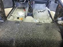 You can see the black speckled material?? This is a thin rubber I can get at work. It is around .050 thick. It is water proof...AND FREE TO ME!!! This turned out to be a GREAT sound proofing material.