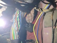 Vacline heading into fender area using the existing antenna cable grommet.