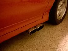 Drivers side exhaust, included.