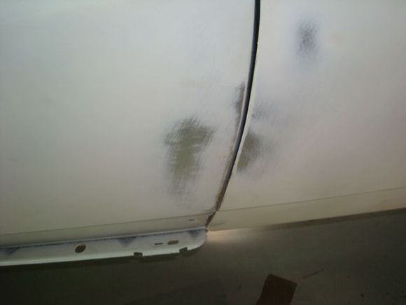 After twisting and bending the lower rear half of the fender to be flush with the door.