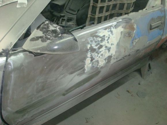 3 strange holes drilled under the mirror but no crease or damage in that area. 