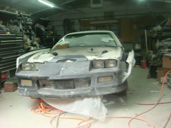 Fenders and bumper cover taken loose.