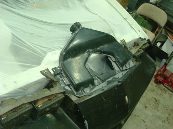 Setting the air filter box in to ck fit.