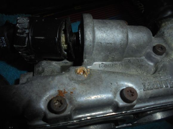 Rung the head off 1 of the coolant plate screws.