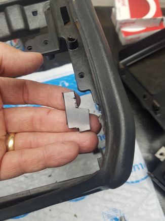 Using a scrap piece of ABS sheet, I cut out this section to build up the backside of the brace.  Piece is shaped to make maximum contact with rhe original material, yet leace room for the slot for the radio faceplate. 
