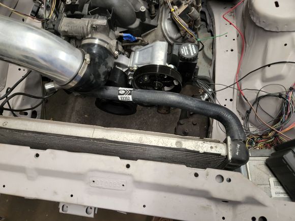 Stock 4th gen ls1 camaro upper radiator hose fits perfectly.