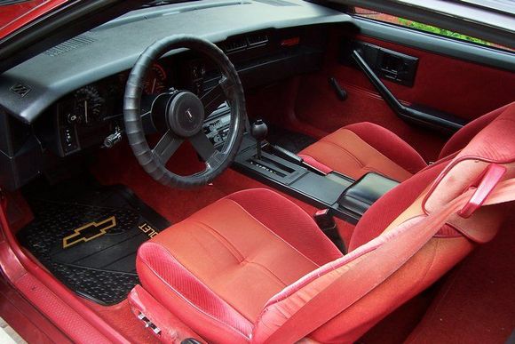 Old Carmine Red Interior.  Good luck finding this fabric.  I looked all over the United States cant find it.