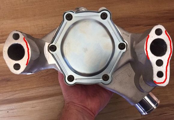 The red lines represent the profile that I had to grind the pump to for clearance around the timing cover and along the accessory bracket.