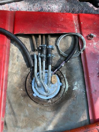 Feed and return connected for now later will seal this stupid hack setup as proper as possible. Eventually I want a new pump setup with proper hard lines or to at least flare these and offset them. Ugh.