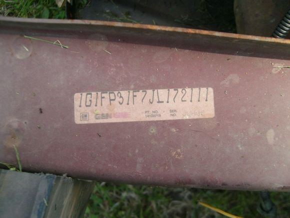 i think this is vin number?...same as one on dash behind windshield....