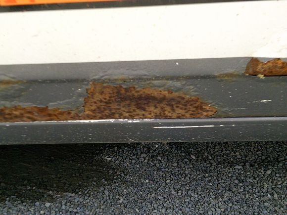 Rust on bottom of drivers door.
