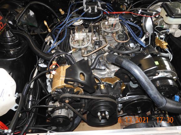 Tidied up the loom, and applied the 303 Aerospace treatment.  Amazing stuff, check out the radiator hose and the windshield wiper motor plastic, rubbed in 8 hours ago, and still looks moist and happy!