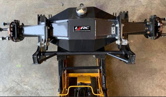 Larry Jeffers built this for me a few years ago, after I had broken the heavily modified 12 bolt I was running. It’s a 40 spline, with strange axles, and third member.