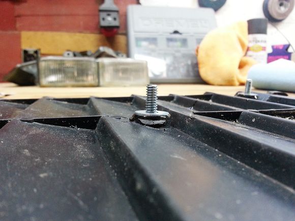 Mixed up the two part epoxy per the directions and added a good amount to each hole. Then all of the bolts with washers were added and I made sure all of the bolts were positioned real well.