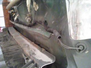 notice the rear bumper mount is smashed in