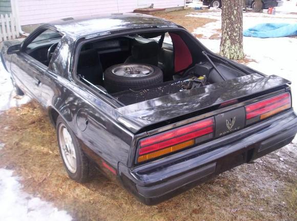 Firebird after vandalized.  Three windows were shot out by a pellet gun.