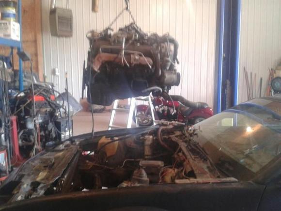 motor coming out of camaro