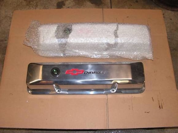 Proform Bow tie polished aluminum valve covers, these might be getting powder coated matte black