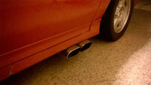 Drivers side exhaust, included.