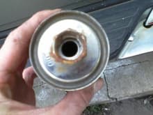 this is the old fuel filter oultet side 
rusty rust came out of this thing when i pulled it off