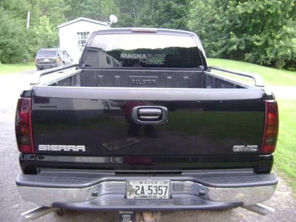 dual side swept custom tailpipes... the old ones... only lasted 5 mnths before i had to buy a full stainless magnaflow system