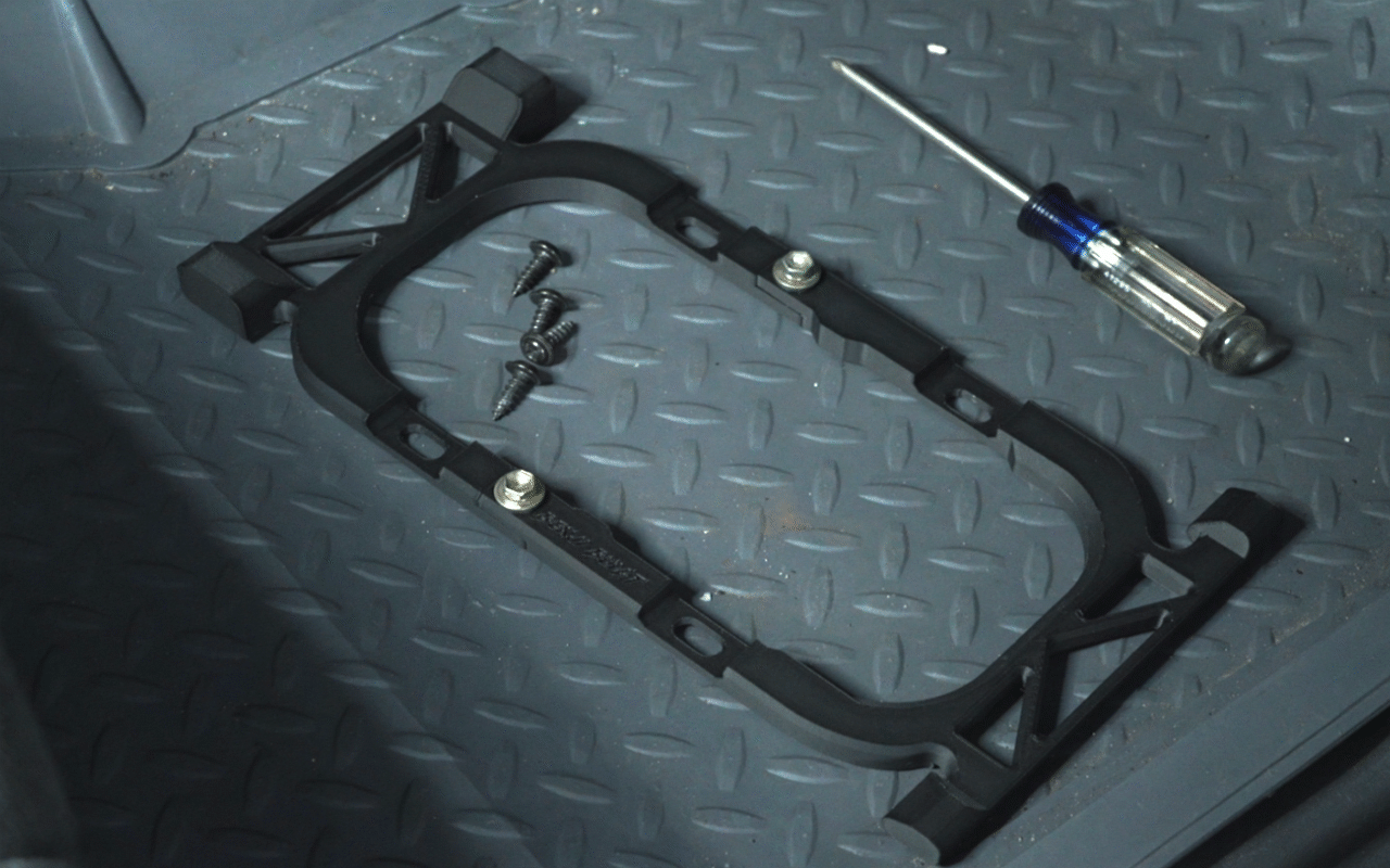 After multiple prototypes, this is the final form of the adapter. It uses two bolts to mount together and uses the OEM screws to mount to the Shifter plate. 