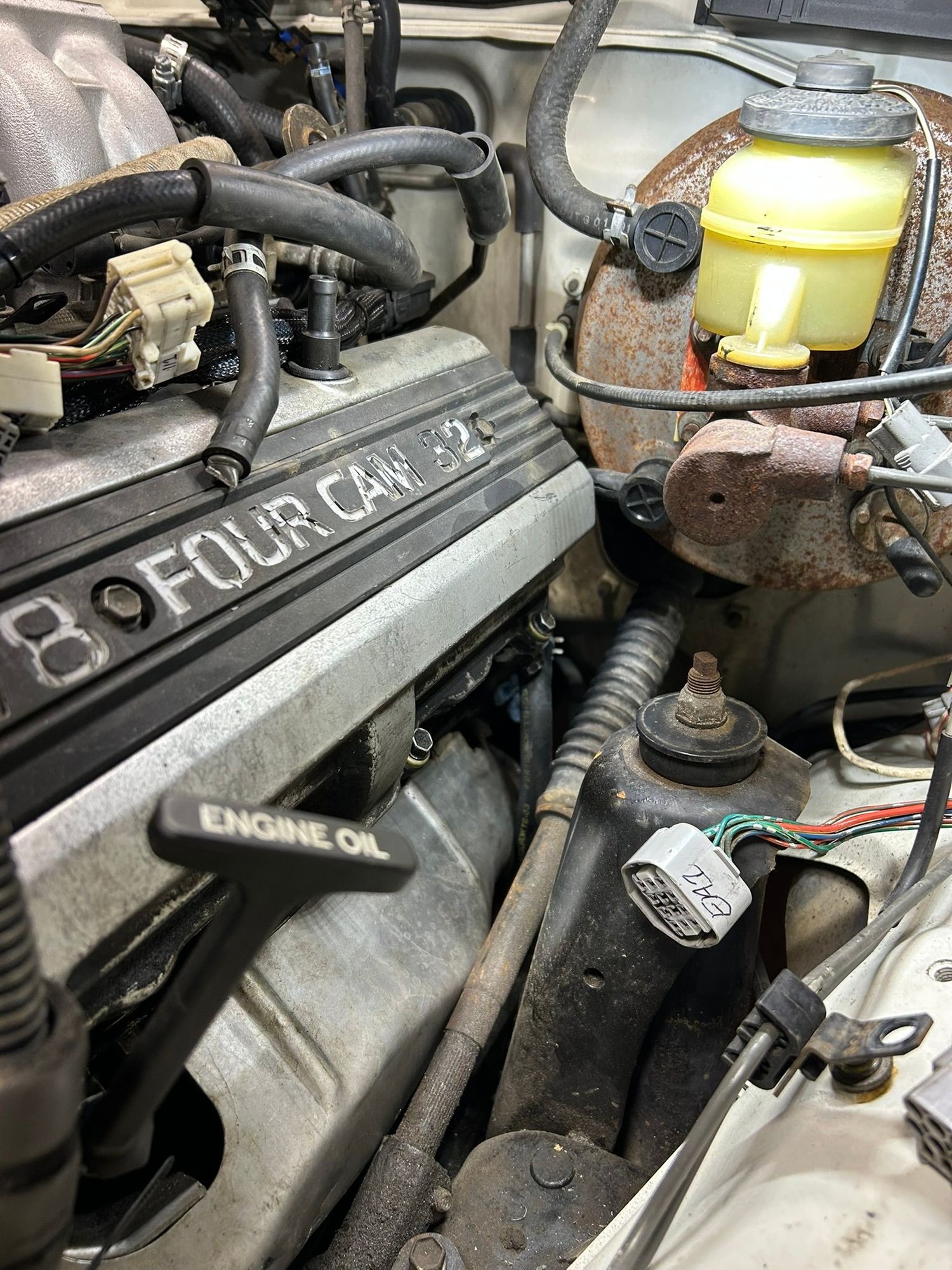 driver side to firewall/master cylinder.