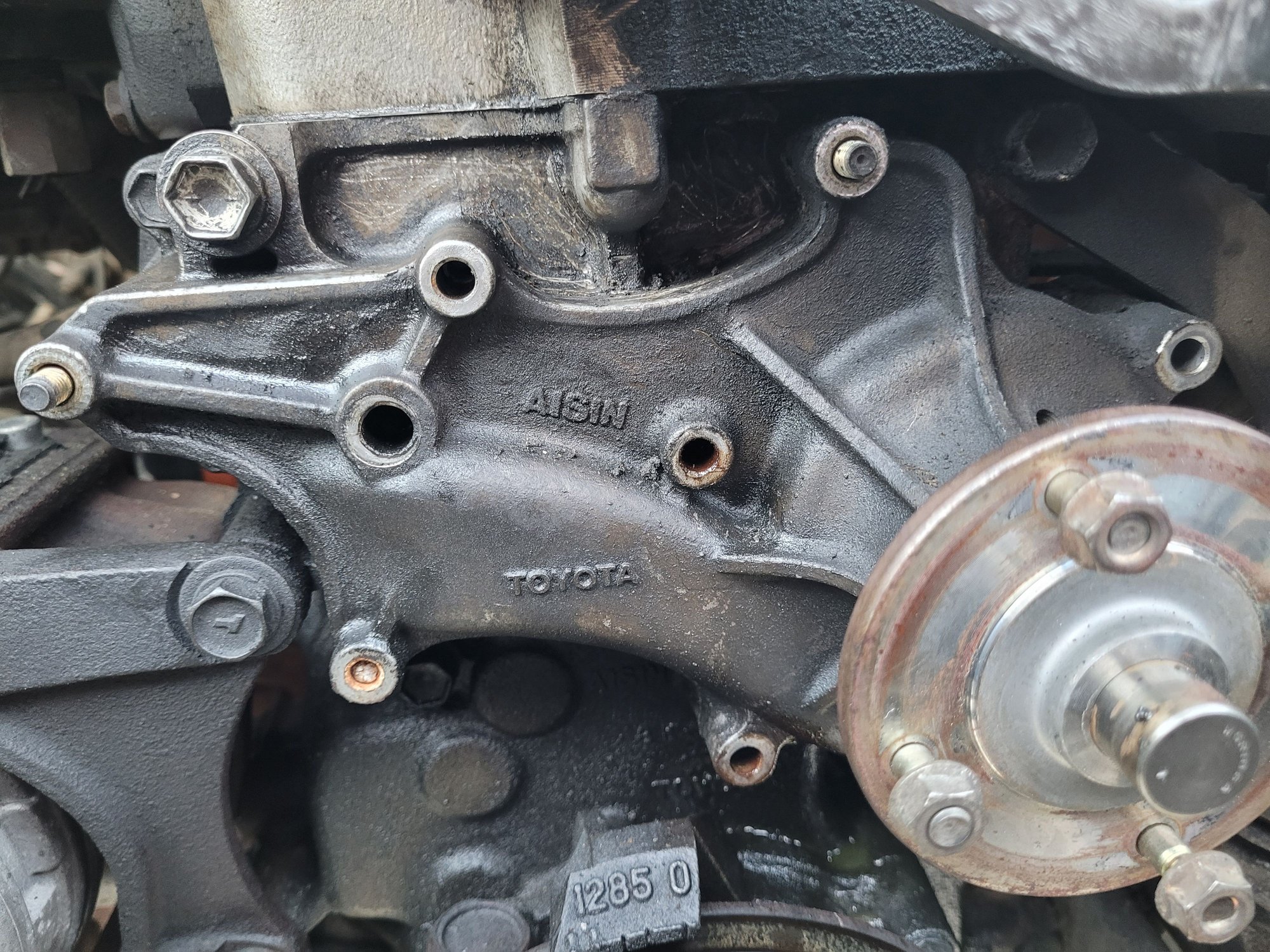 Broke the bolt off flush on the bottom left side. Still have to get it out.