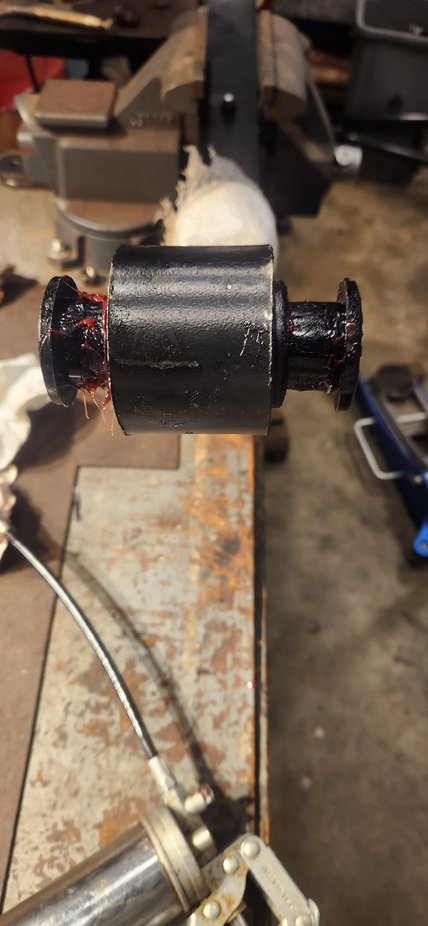 Grease on bushing and inside leaf spring.