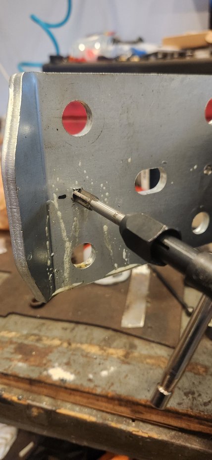 At the moment we will not be adding bumpstops for the rear. But just incase he decides to add stops later i drilled and taped the same as front. 17/64 hole and a M8x1 25 tap. After this the plates got a quick hand sanding, cleaned and painted.